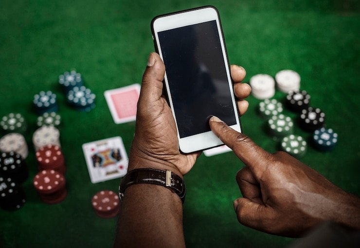 Antarmuka pemain SA Gaming di smartphone, menampilkan meja Blackjack dengan chat dealer